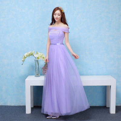ชุดราตรียาวสีม่วงเย็บติดด้วยคลุมไหล่สวยงาม