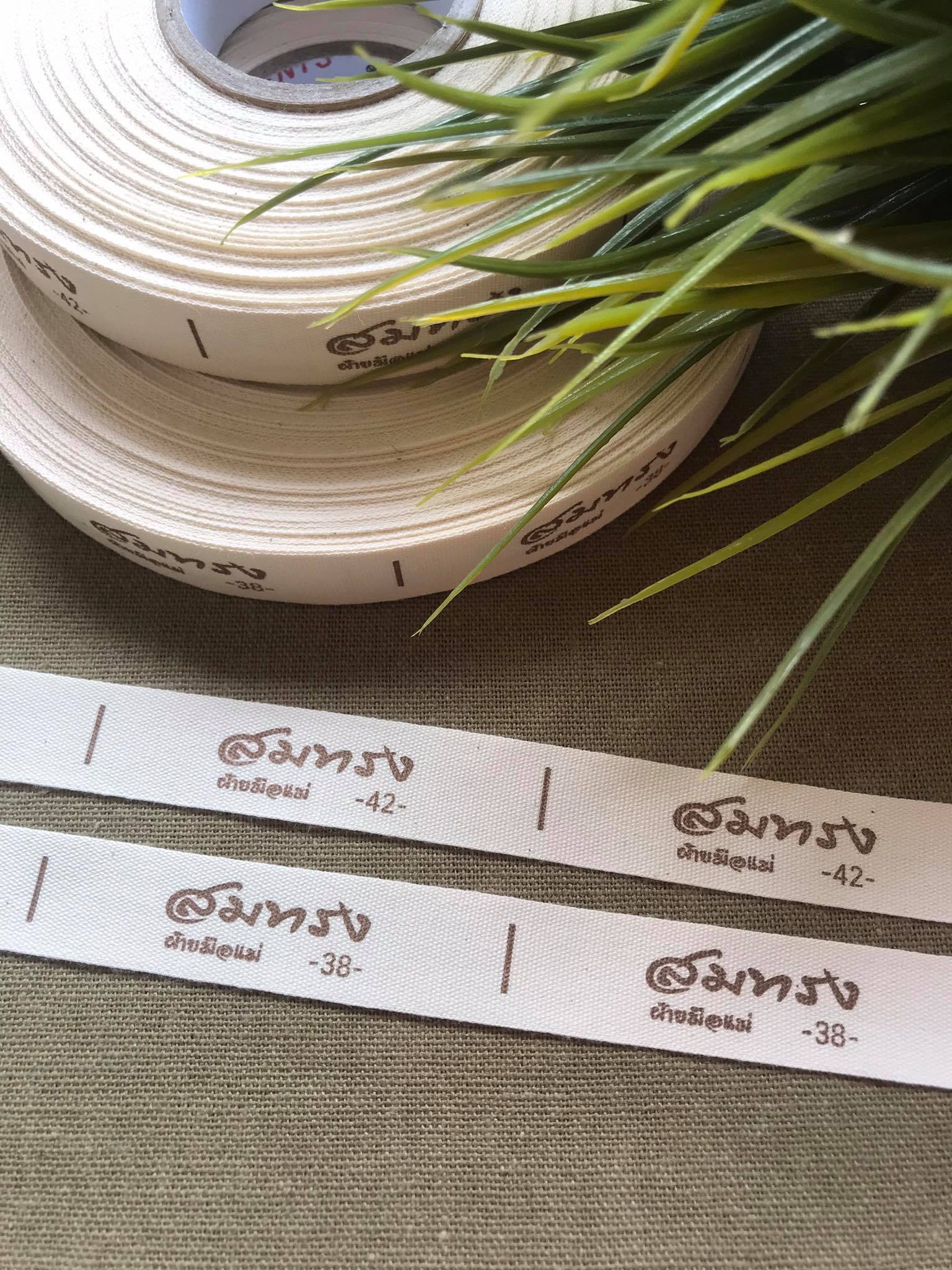 ป้ายผ้าดิบ (สีครีม)